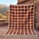 Ecru Moroccan rug with geometric patterns 200cm x 270cm.