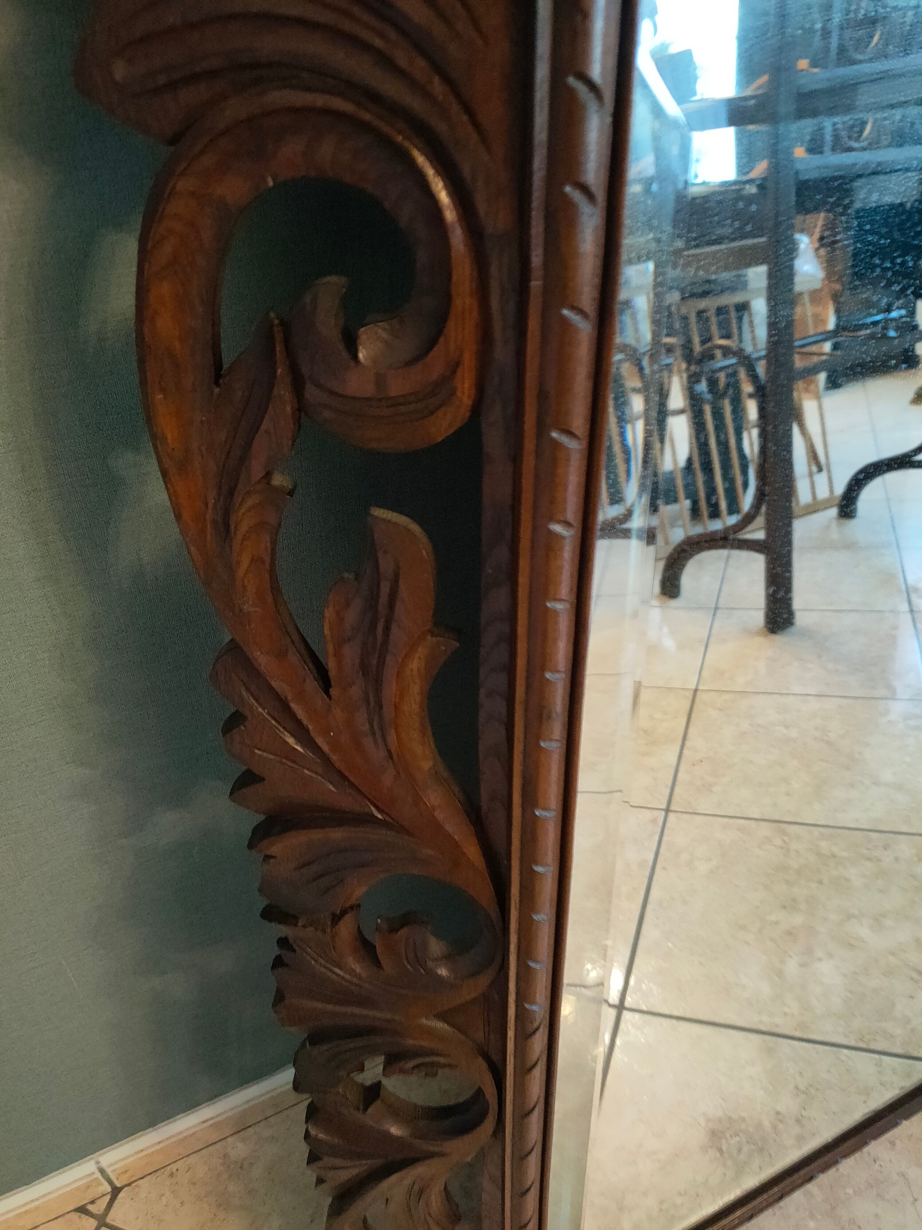Antique mirror in openwork carved wood
