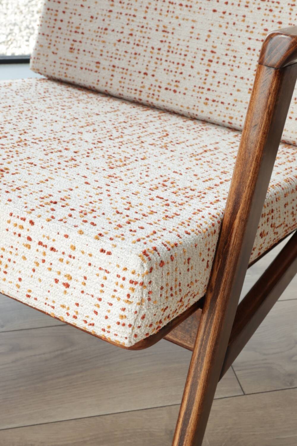 Vintage Danish boucle armchair with orange polka dots from the 1960s.