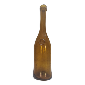 Biot amber blown glass bottle