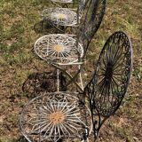 Ancient folded garden lounge in cast iron
