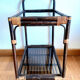 Rattan and smoked glass rolling service