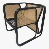 Armchair in black lacquered rattan and natural cane