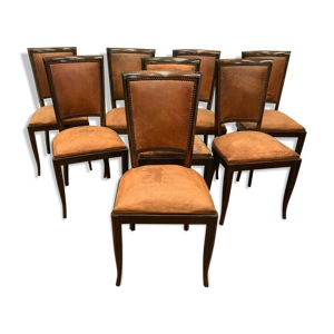 suite de 8 chaises en bois teinté assise et dossier en cuir fauve années 1970