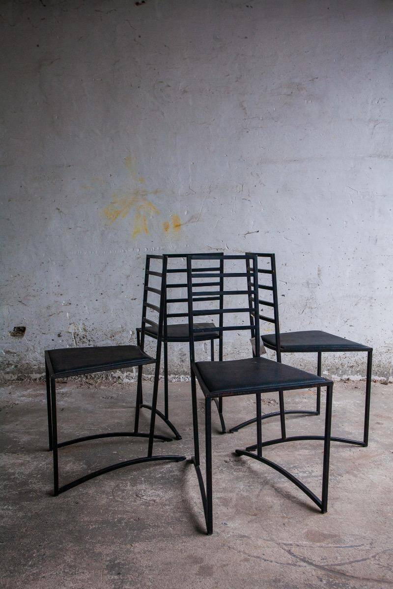 Set of 4 Black Steel Dining Chairs with Black Faux-Leather Seats — Minimalist Geometric Design
