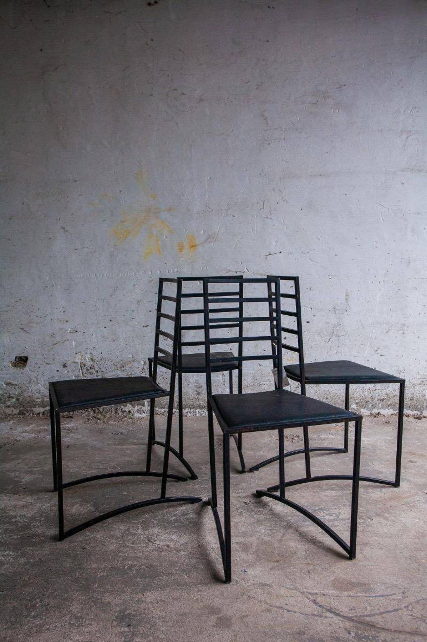 Set of 4 Black Steel Dining Chairs with Black Faux-Leather Seats — Minimalist Geometric Design