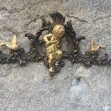 Pediment cherub musician