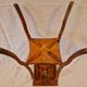 Antique Art Nouveau pedestal table with carved wood and marble top.