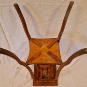 Antique Art Nouveau pedestal table with carved wood and marble top.