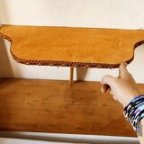 Console covered in velvet to hang
