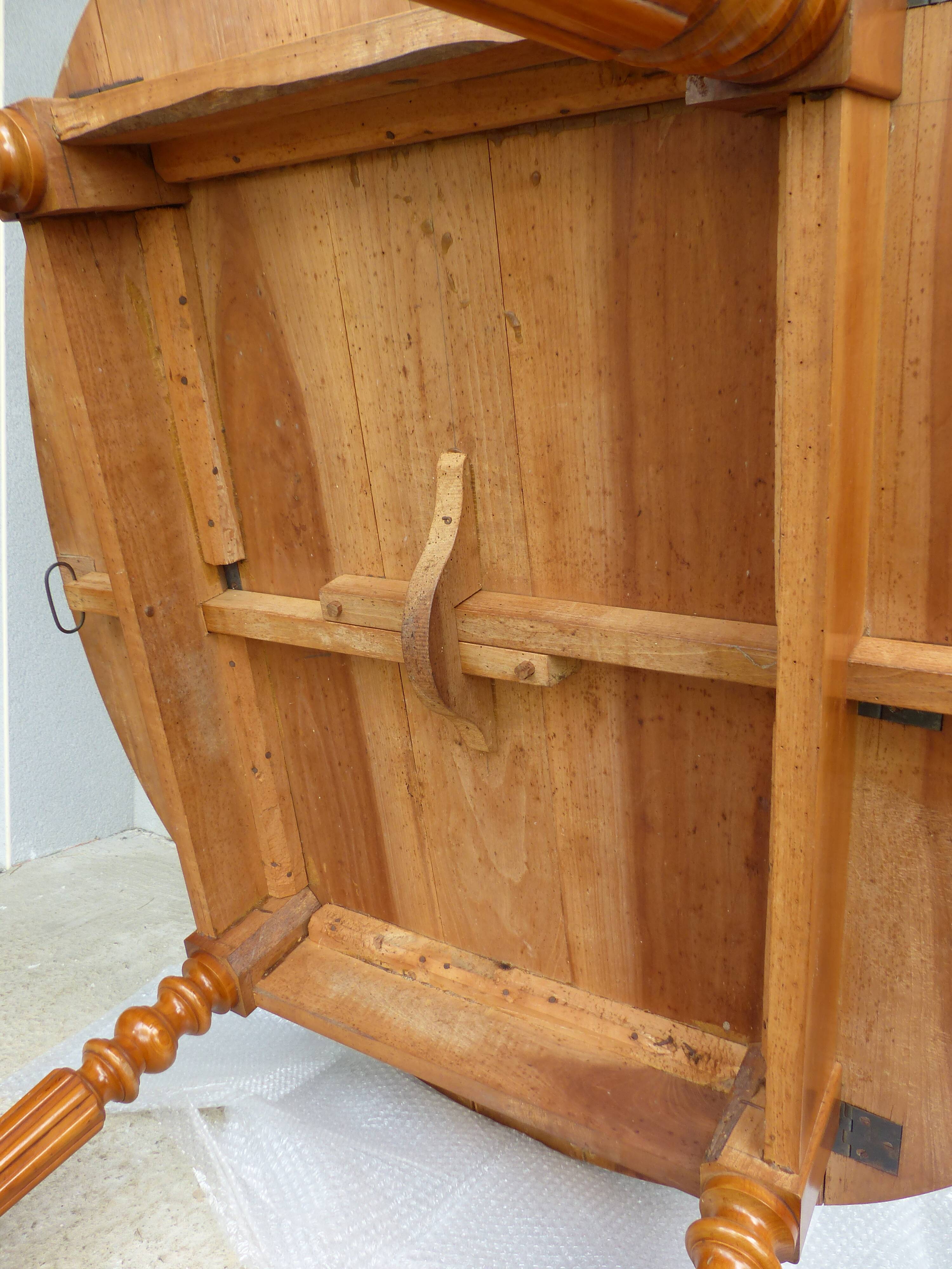 Cherry wood shuttered table.
