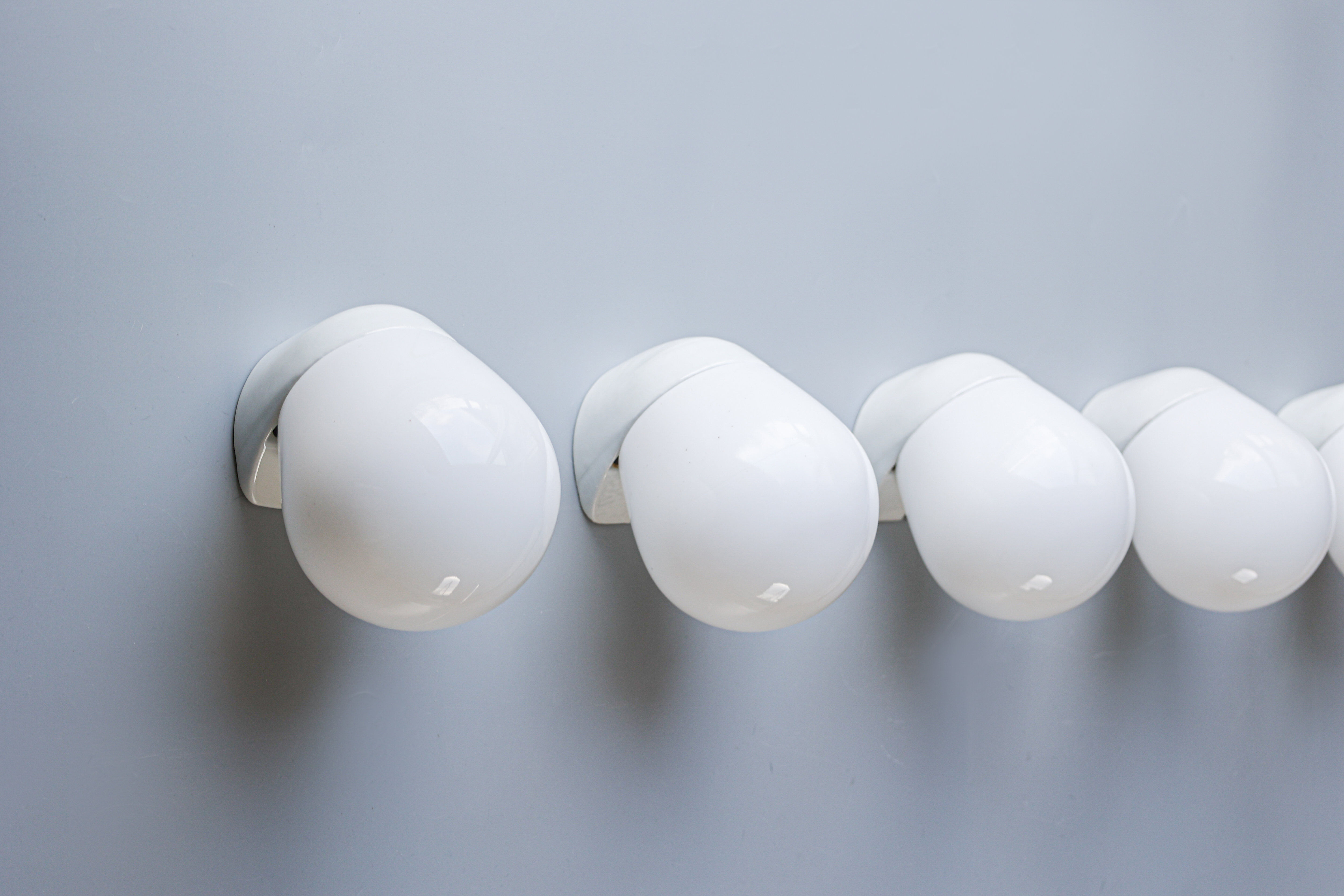 Wilhelm Wagenfeld, ceiling lights, porcelain, 1950s.