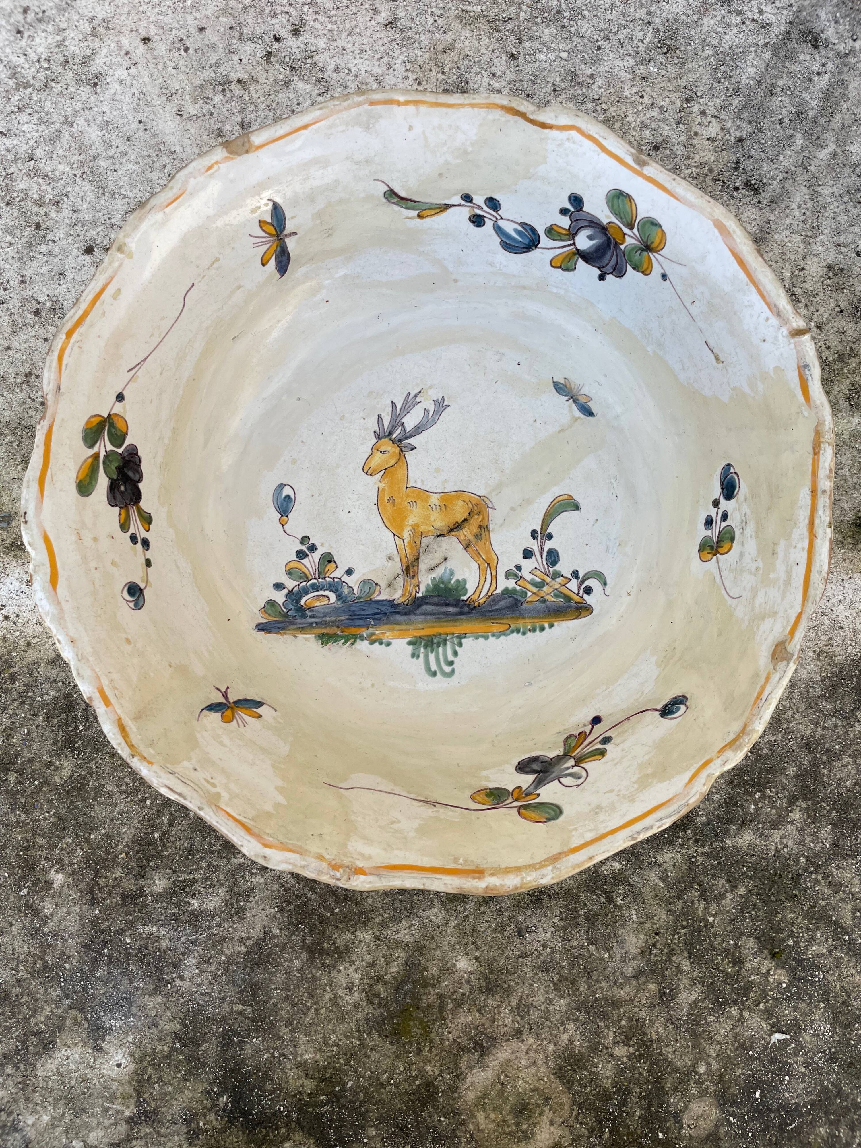 Antique dish with deer pattern