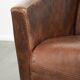 Cowhide armchair in Aviator design in a warm brown colour