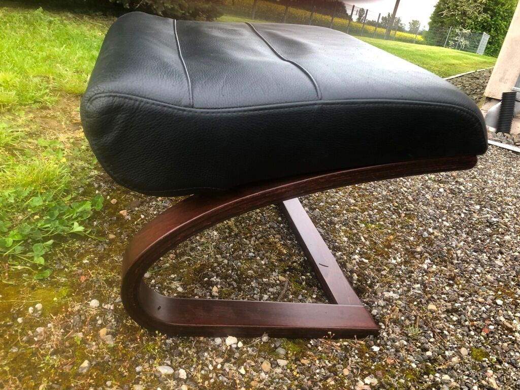 Armchair with its designer footrest Nelo Sweden