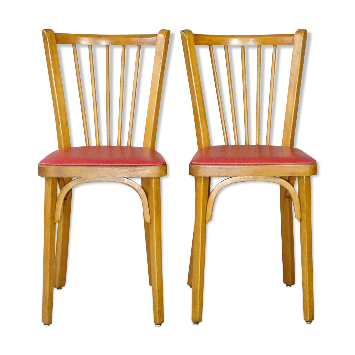 Pair of red Baumann skai chairs 1960