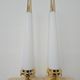 Pair of Hollywood Regency table lamps in brass with glass shades.