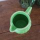 Green ceramic jug