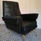 Pair of vintage leather armchairs