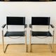 Pair of tubular armchairs in metal and leather Style Marcel Breuer