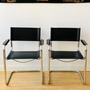 Pair of tubular armchairs in metal and leather Style Marcel Breuer