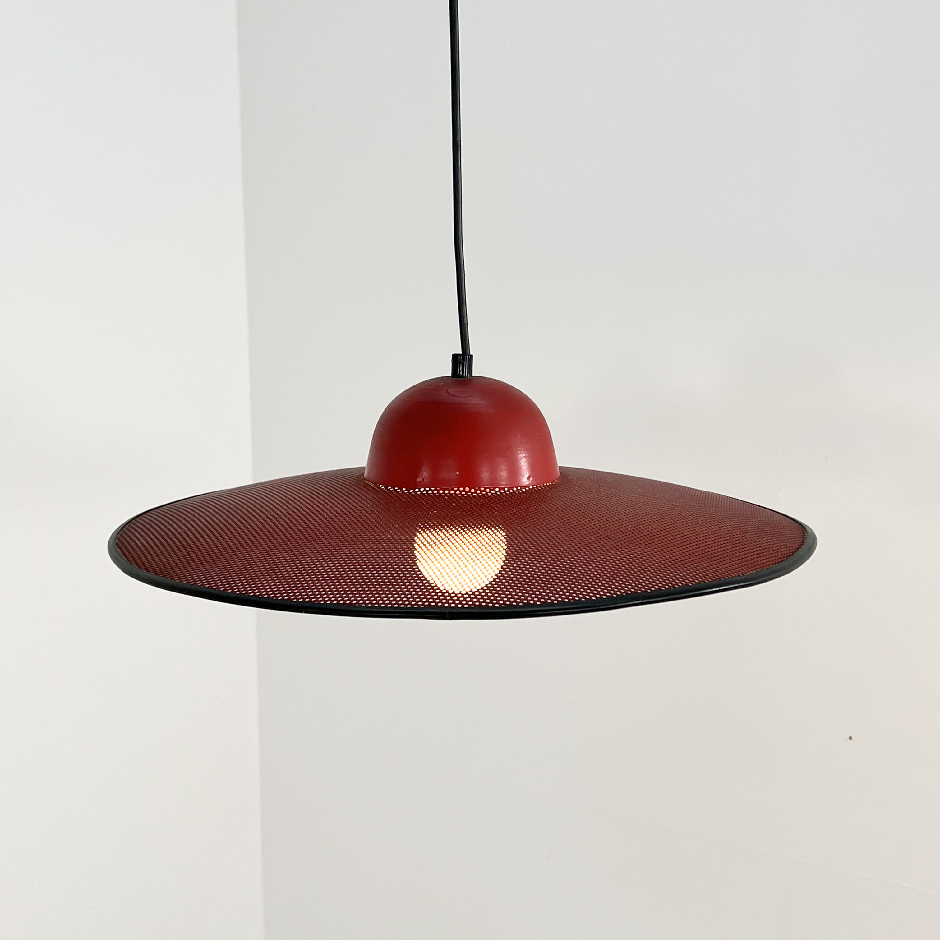 Red suspension lamp in perforated metal, 1970