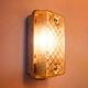 Old wall lamp in cast aluminum and squared glass