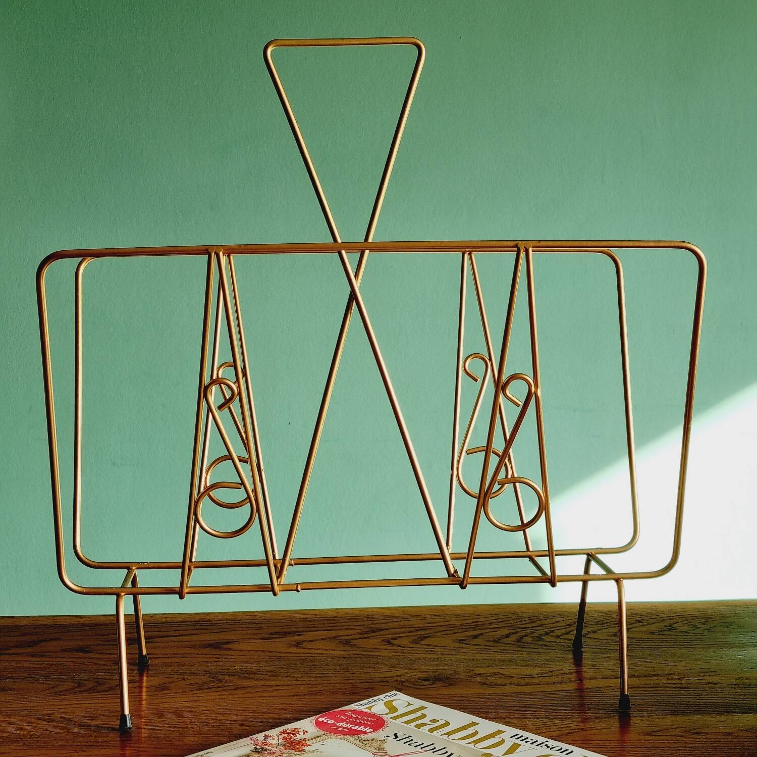 Golden metal magazine holder