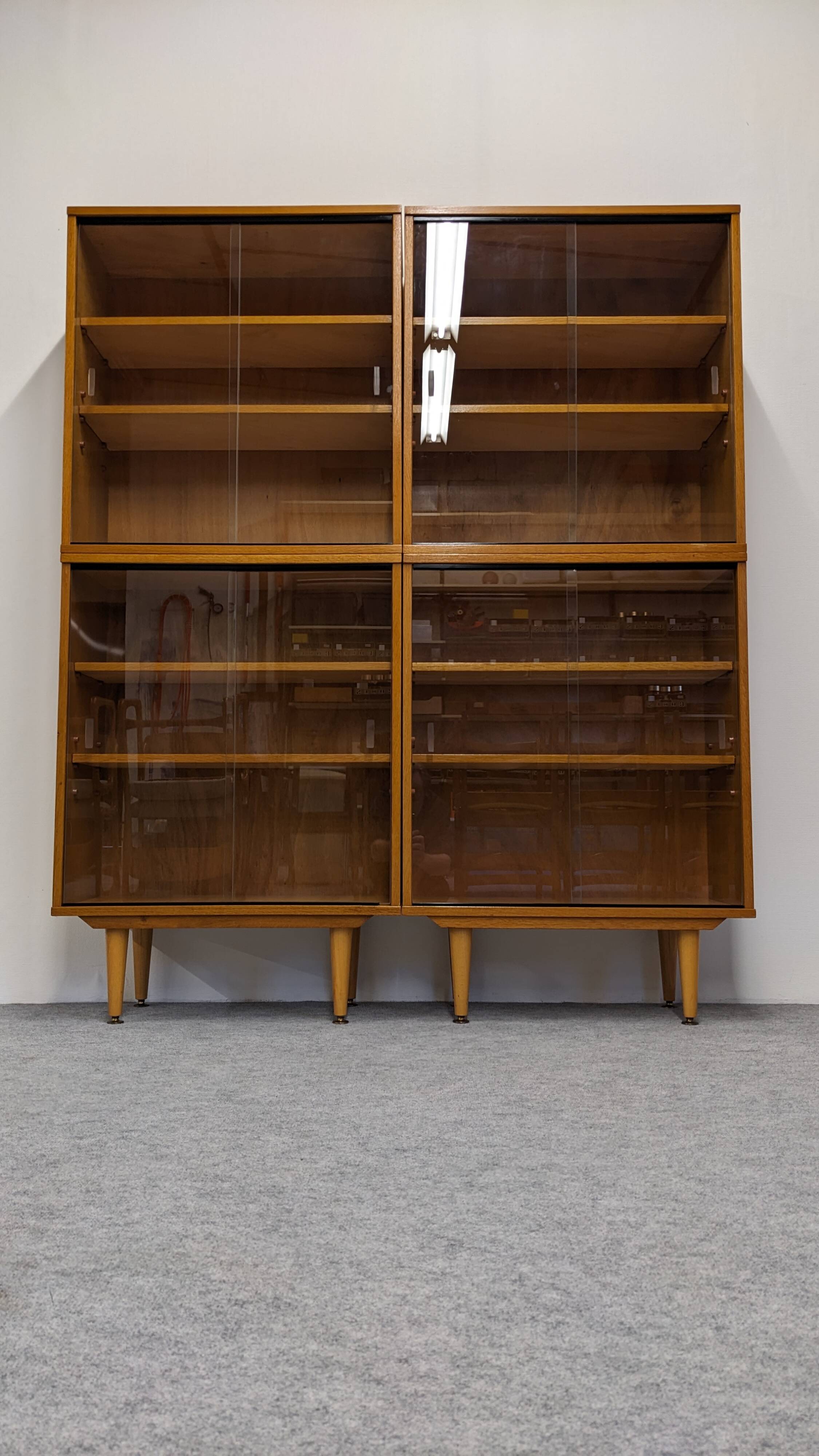 Library or display cabinet with 4 modules in light oak, France around 1960.
