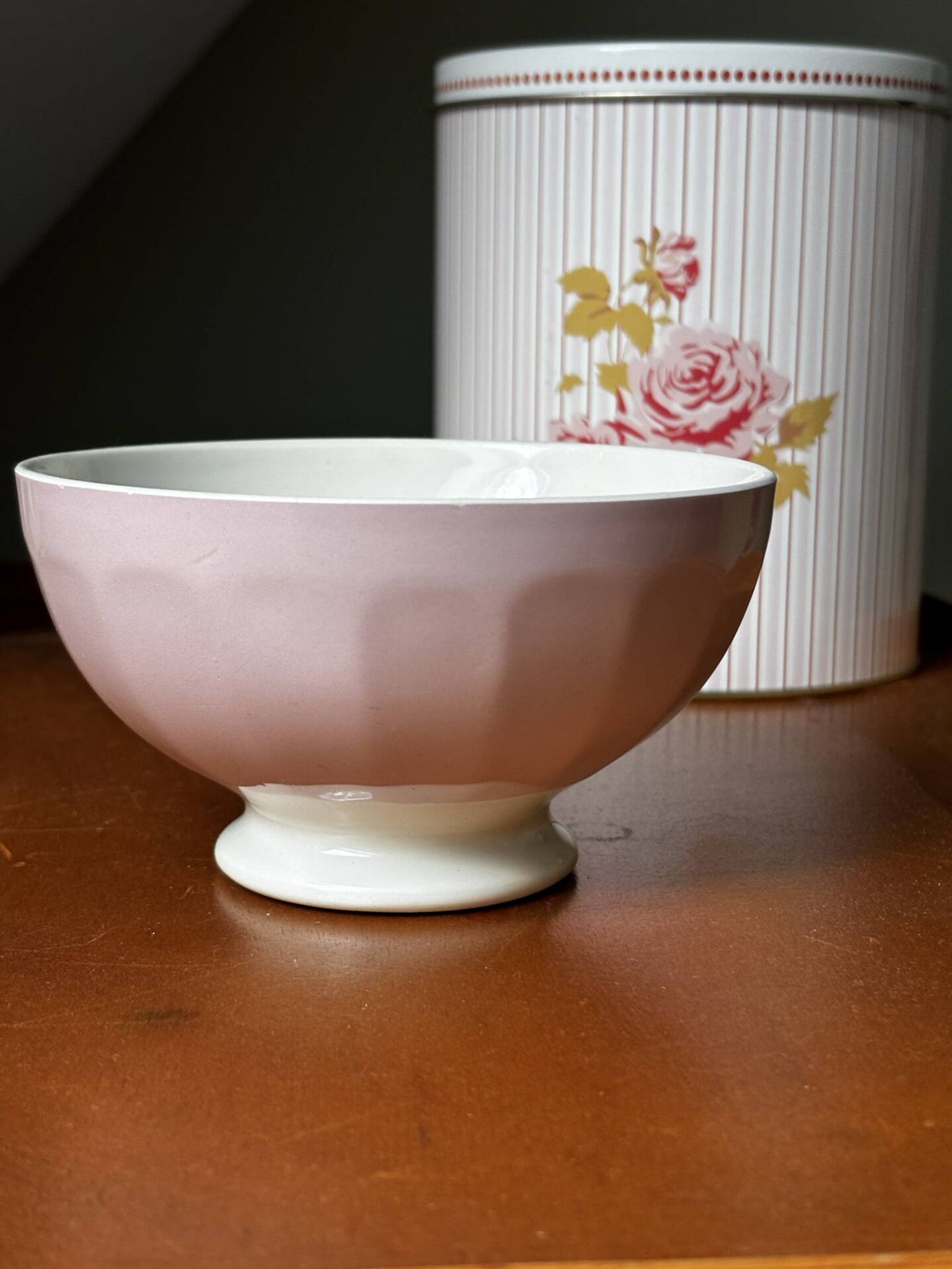 Old faceted bowl in pink earthenware