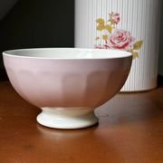 Old faceted bowl in pink earthenware