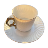 White cups with golden handle