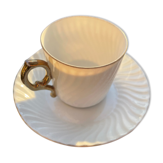 White cups with golden handle