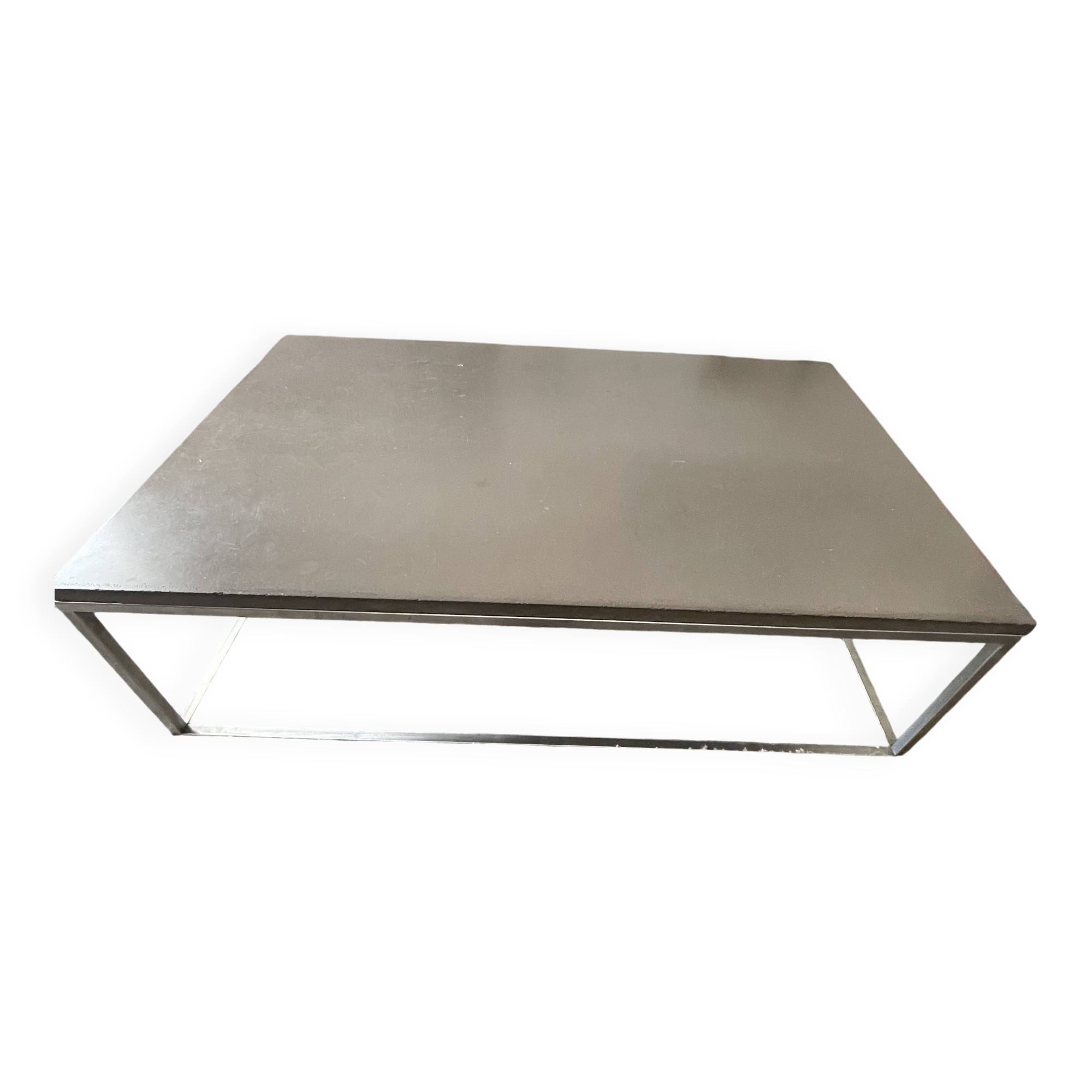Coffee table in stone and brushed steel