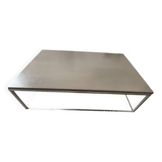 Coffee table in stone and brushed steel
