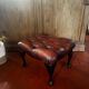Red leather footrest in Chesterfield style, vintage 1970s.