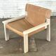 Fauteuil en cuir sellier couleur cognac