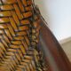 Woven rattan armchair and exotic wood in colonial style, 1980s.