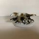 Chiens en porcelaine