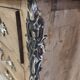 Stripped chest of drawers with bronze handles