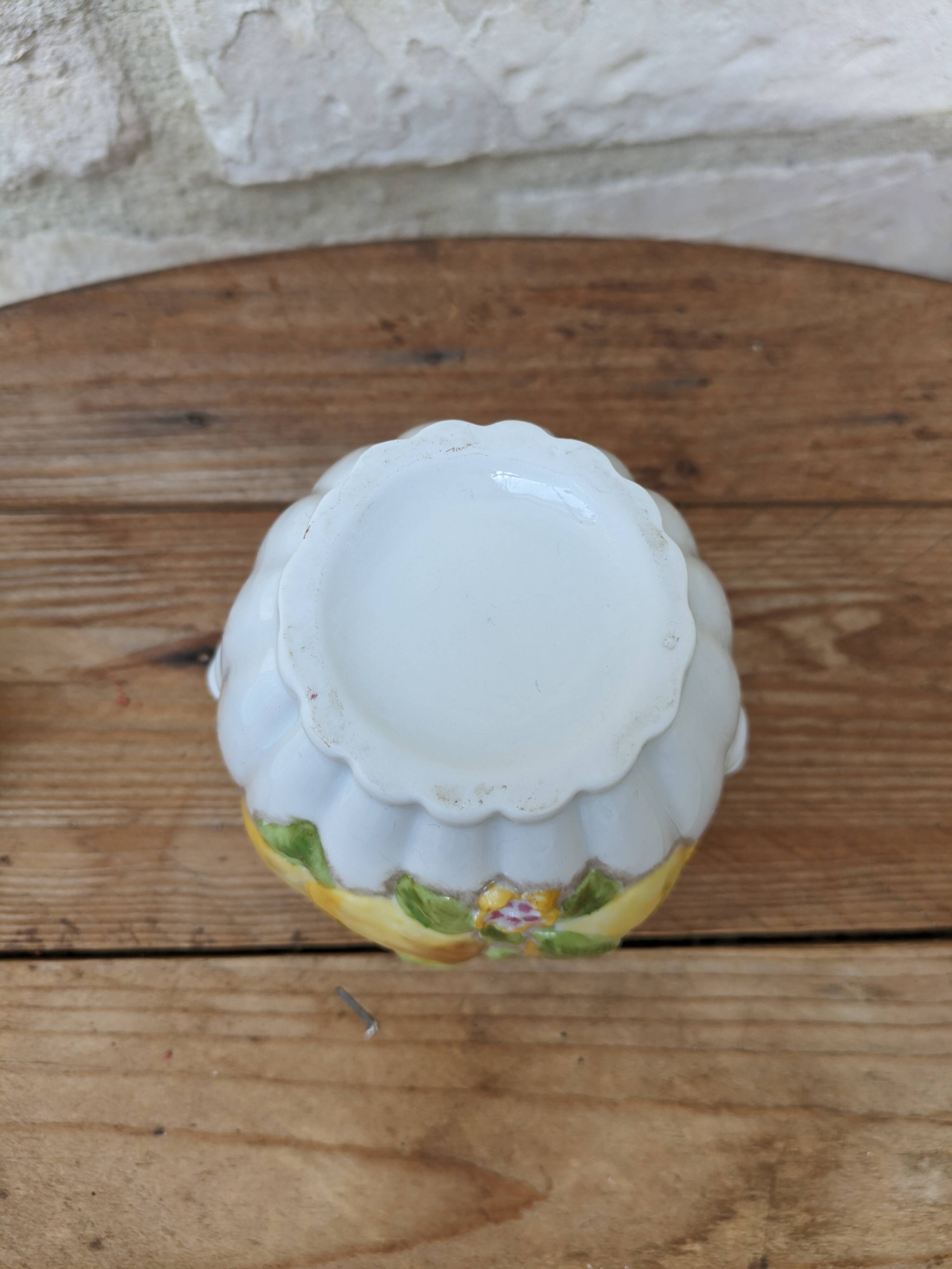 Old ceramic sugar bowl with yellow fruit motif
