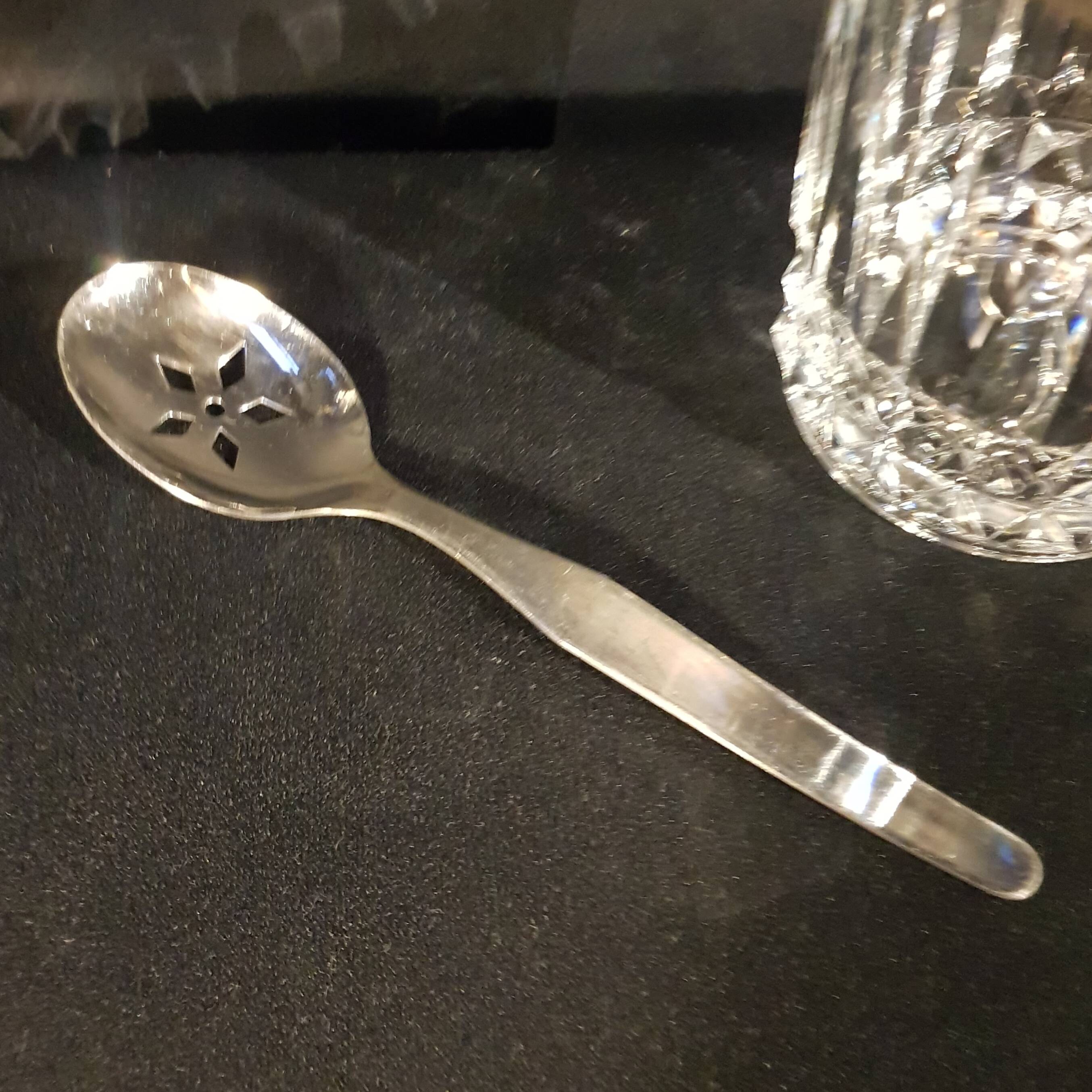 Crystal ice bucket and stainless steel spoon