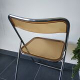 Seventies stainless steel and caramel chairs