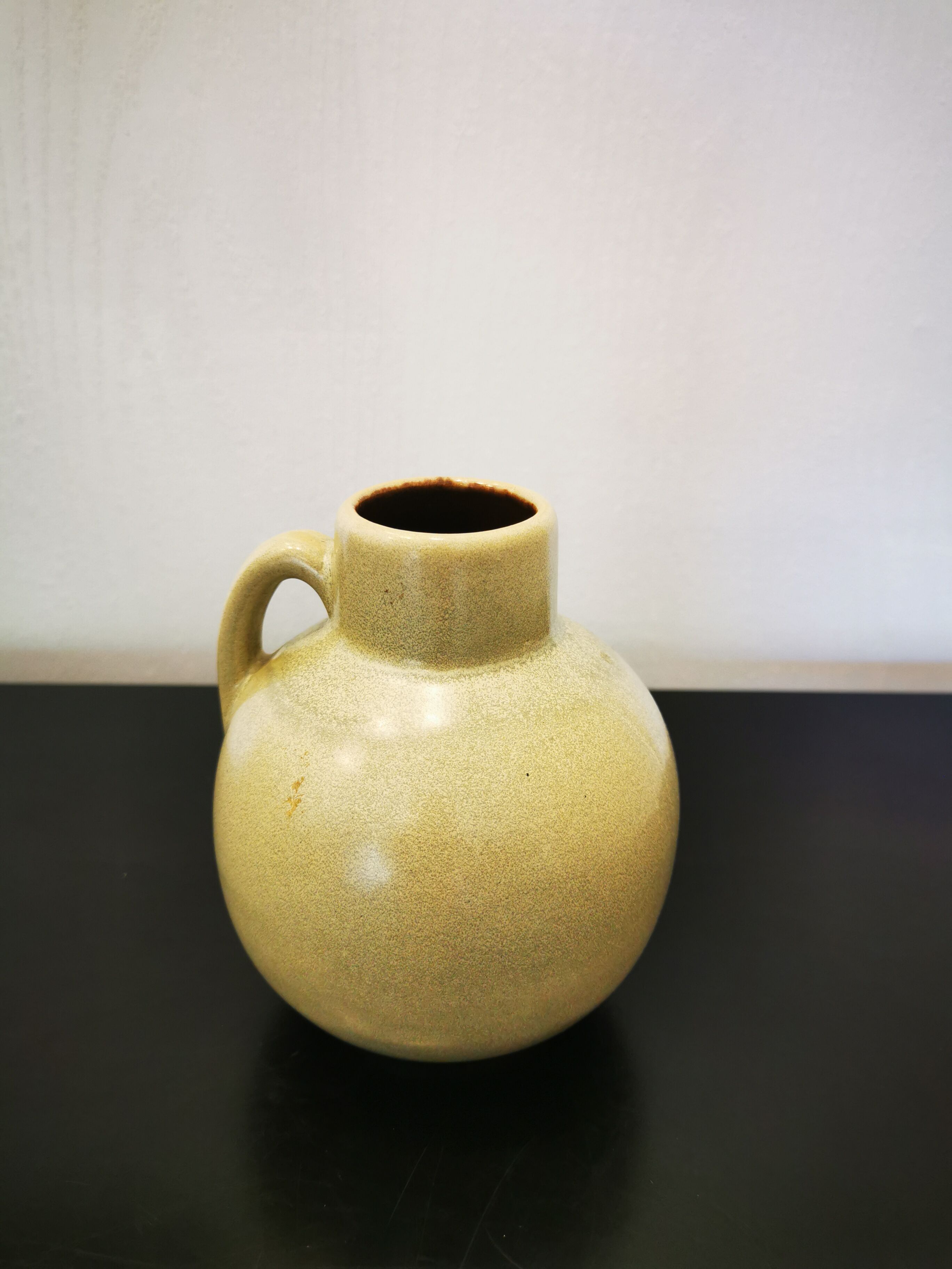 Vintage sleek handle vase