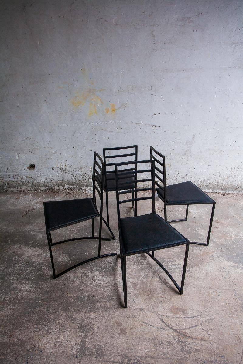 Set of 4 Black Steel Dining Chairs with Black Faux-Leather Seats — Minimalist Geometric Design