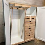 Wardrobe with two wardrobe compartments and drawers