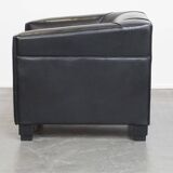Very comfortable black Art Deco design armchair, made of sheepskin leather