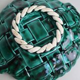 Green braided earthenware cut