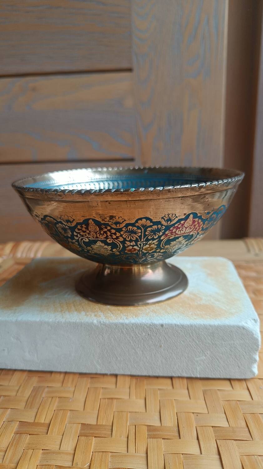 Brass footed bowl with coloured patterns