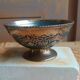 Brass footed bowl with coloured patterns